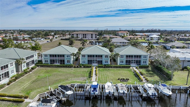 drone / aerial view with a water view