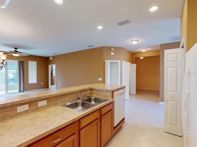 kitchen with sink, dishwasher, and ceiling fan