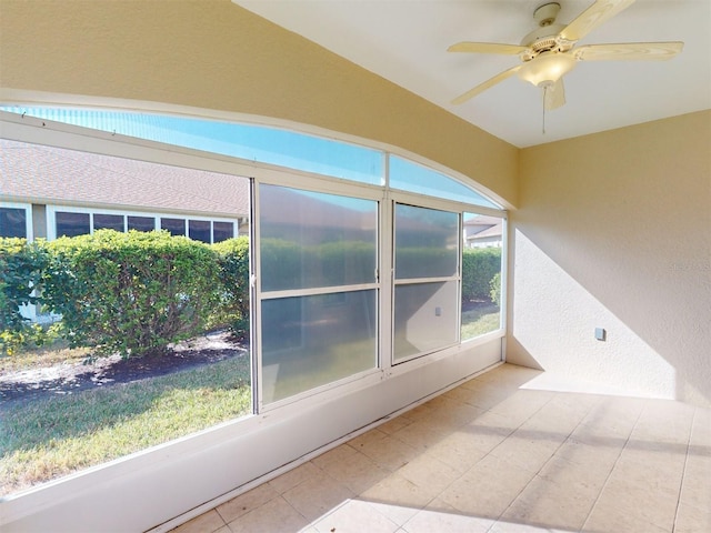 spare room with ceiling fan