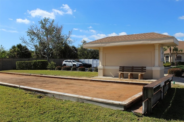 wooden terrace featuring a yard