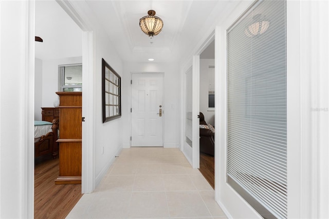 hallway featuring light tile patterned floors