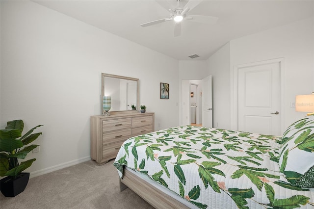 bedroom featuring ceiling fan and light carpet