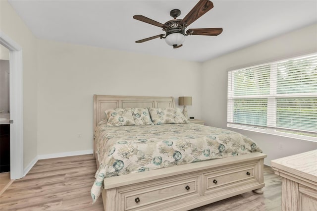 bedroom featuring ceiling fan and light wood-type flooring