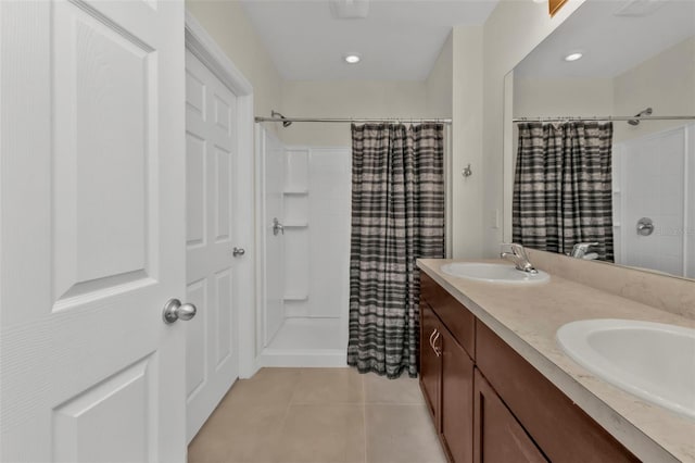 bathroom featuring vanity, tile patterned floors, and a shower with shower curtain