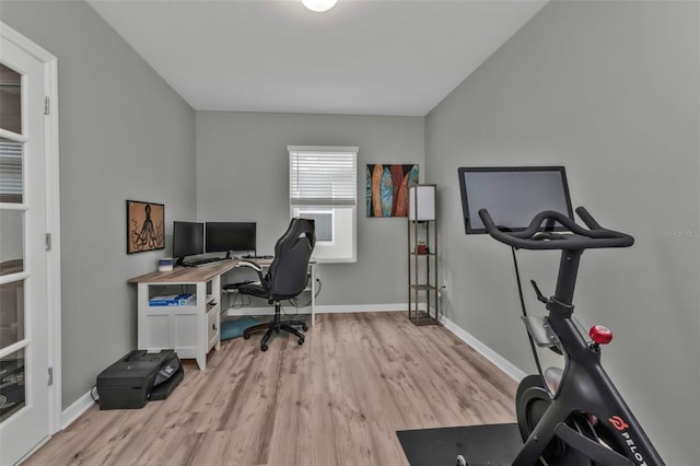 office area with light hardwood / wood-style floors