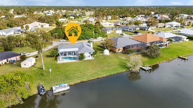 bird's eye view with a water view