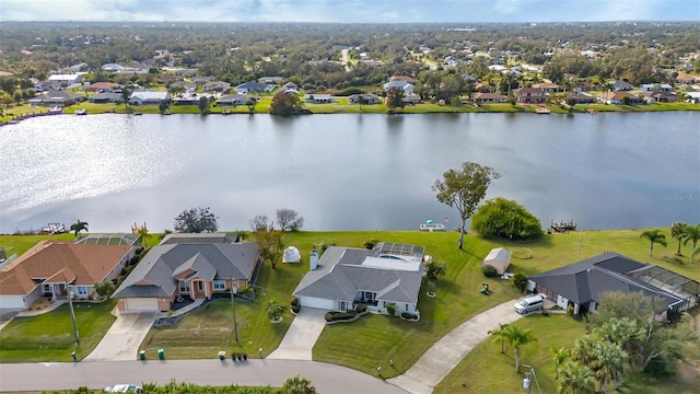 birds eye view of property featuring a water view