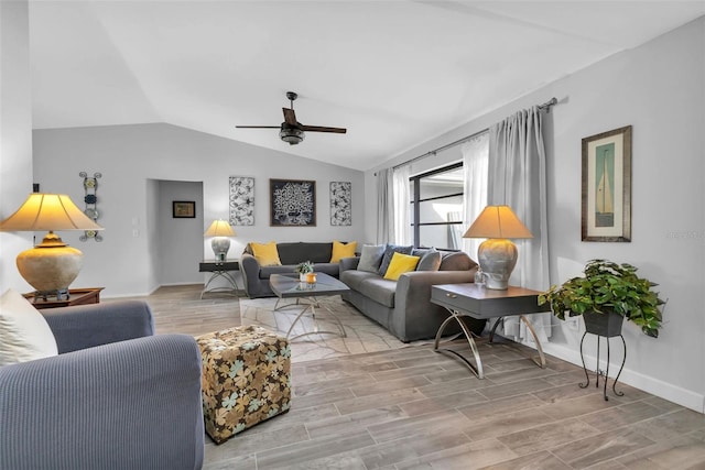 living room with ceiling fan and lofted ceiling