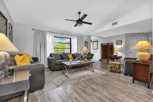 living room with vaulted ceiling and ceiling fan