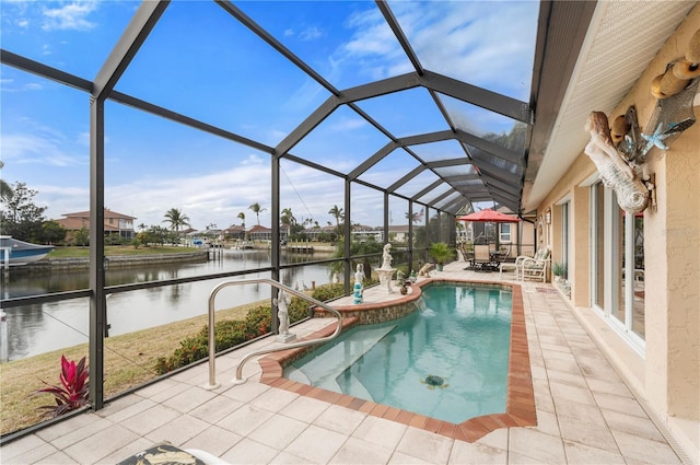 view of pool featuring a water view, a patio, and a lanai