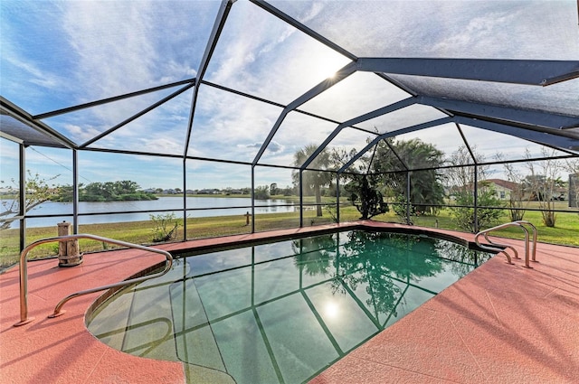 view of swimming pool with a water view, a patio, and glass enclosure