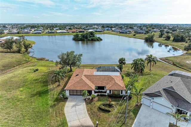 aerial view featuring a residential view and a water view
