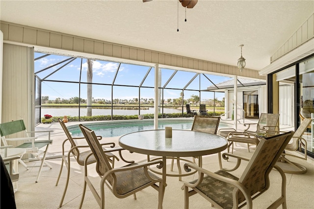 sunroom with a pool