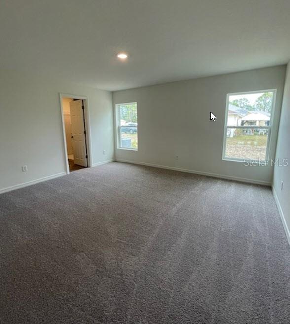 view of carpeted spare room