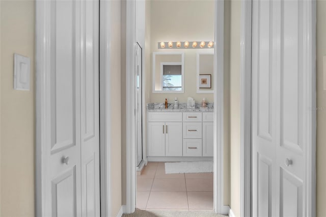 bathroom with vanity and tile patterned floors