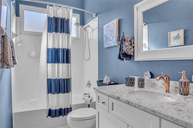 full bathroom featuring vanity, toilet, and shower / bath combo