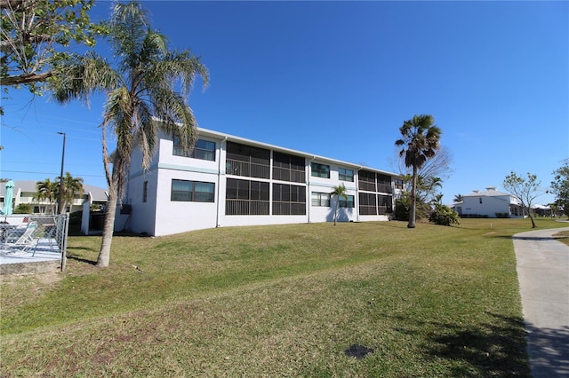 exterior space with a lawn