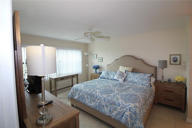 bedroom featuring light tile patterned floors and ceiling fan