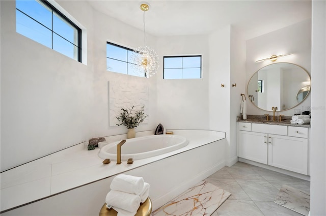 bathroom with vanity and a bathing tub