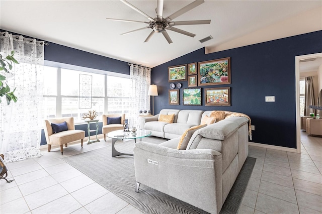 tiled living room featuring lofted ceiling and ceiling fan