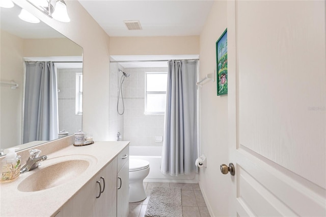 full bathroom with vanity, shower / bath combo, tile patterned floors, and toilet