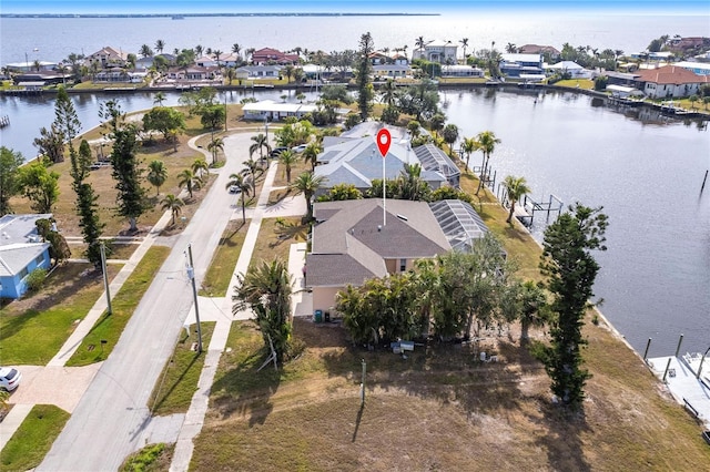 drone / aerial view featuring a water view