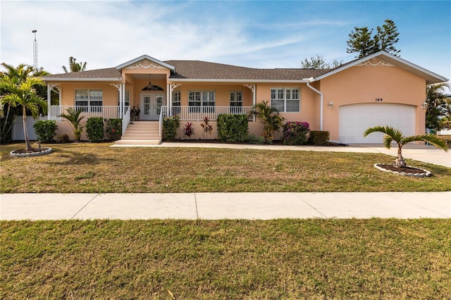 single story home with a garage, covered porch, and a front yard