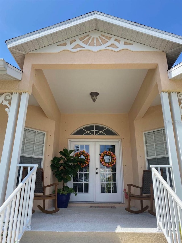 property entrance featuring french doors