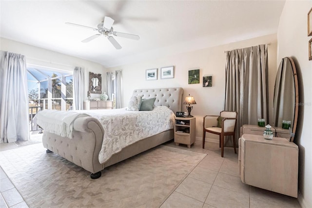 bedroom with access to outside, light tile patterned floors, and ceiling fan