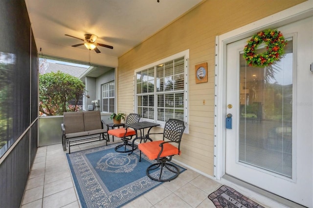 sunroom / solarium with ceiling fan