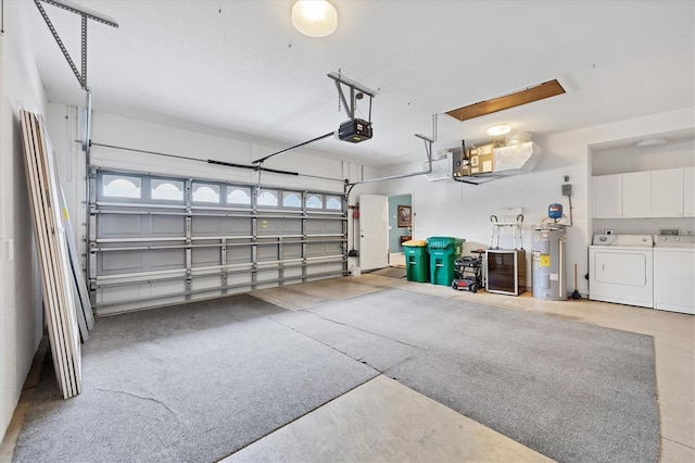 garage with a garage door opener, washing machine and dryer, and water heater