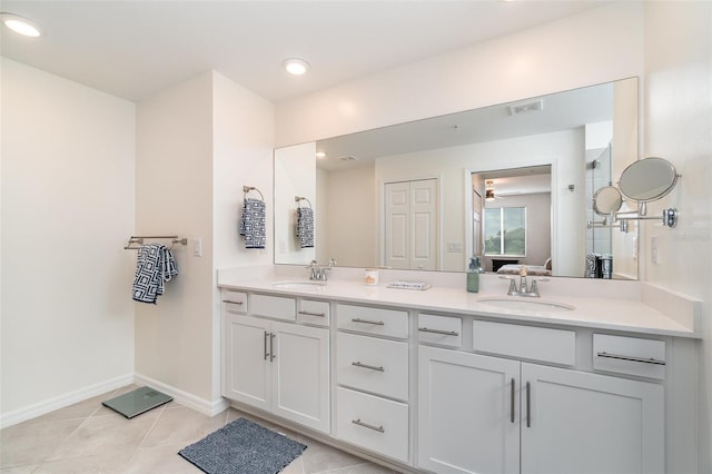 bathroom featuring vanity and tile patterned flooring