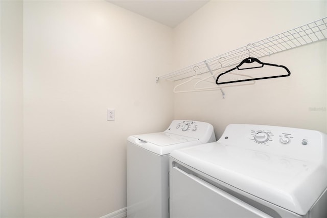 washroom with washer and clothes dryer