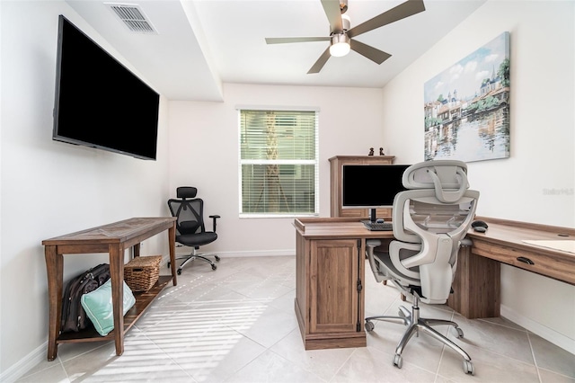 office space with ceiling fan and light tile patterned floors