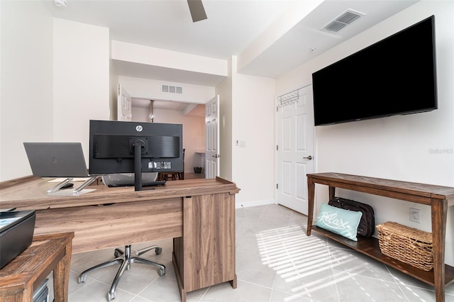 tiled office with ceiling fan