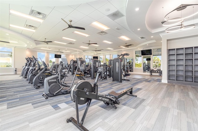 exercise room featuring light colored carpet