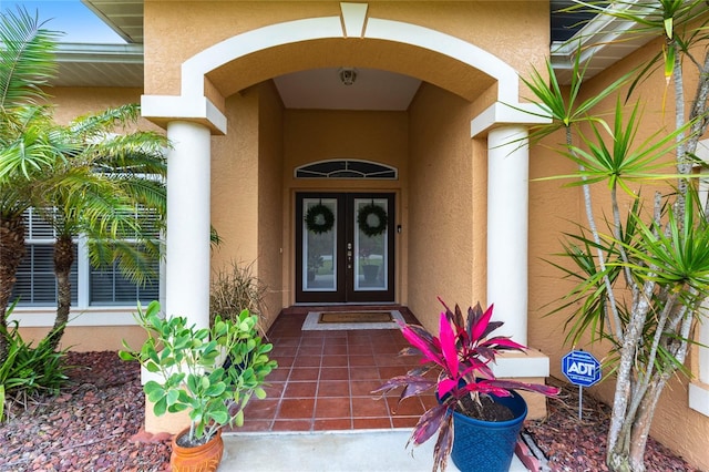 doorway to property featuring french doors