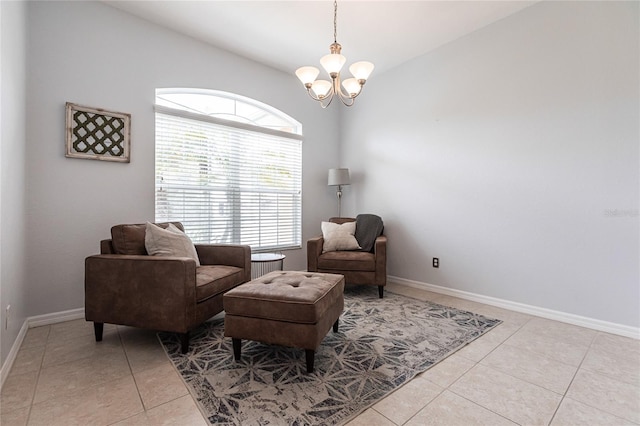 living area featuring a notable chandelier and light tile patterned flooring