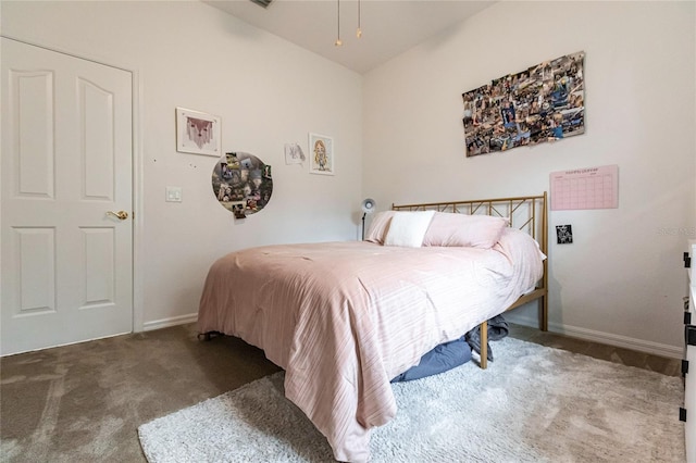 bedroom with dark carpet