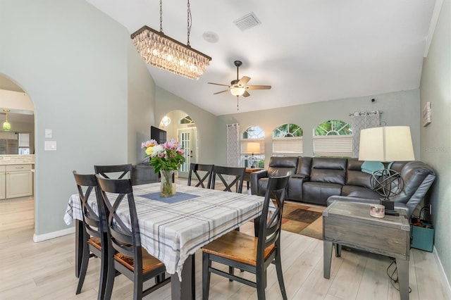 dining area with lofted ceiling, light hardwood / wood-style floors, and ceiling fan