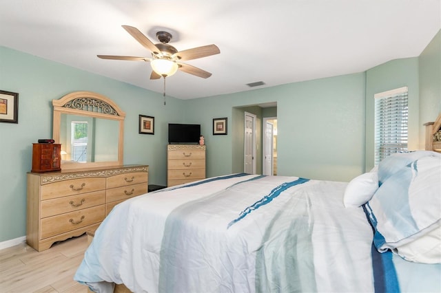 bedroom featuring ceiling fan and light wood-type flooring