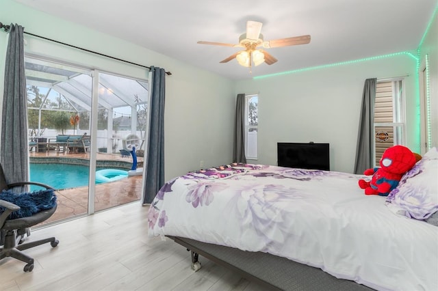 bedroom with light wood-type flooring, access to exterior, and ceiling fan