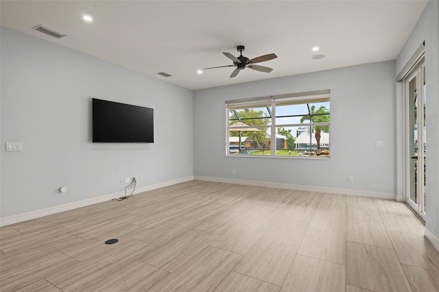 unfurnished living room with ceiling fan and light wood-type flooring