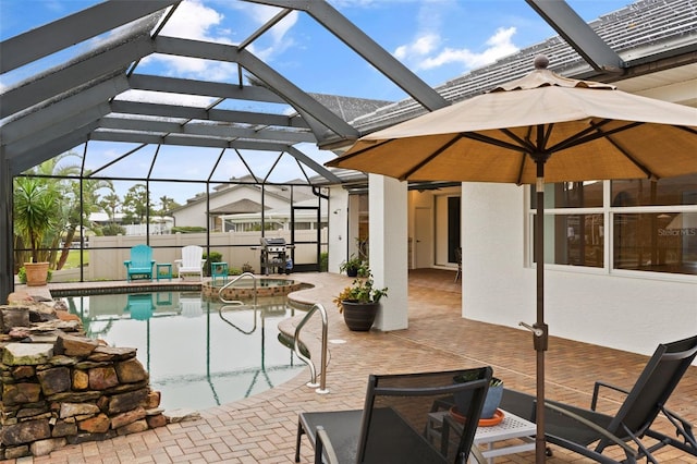 view of pool featuring area for grilling, a jacuzzi, a patio, and glass enclosure