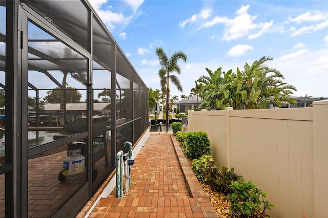 view of property exterior featuring a lanai