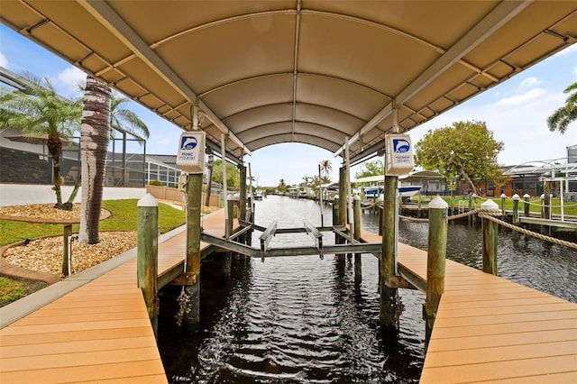 dock area with a water view