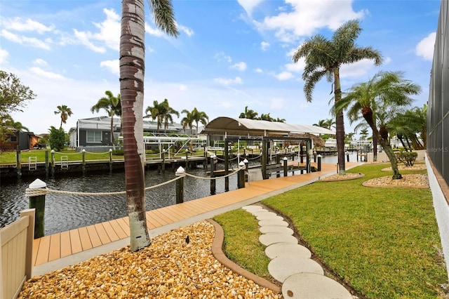 view of dock featuring a water view, a lanai, and a lawn