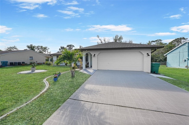 single story home featuring a garage and a front yard