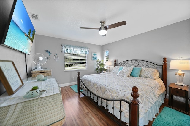 bedroom featuring ceiling fan and hardwood / wood-style floors