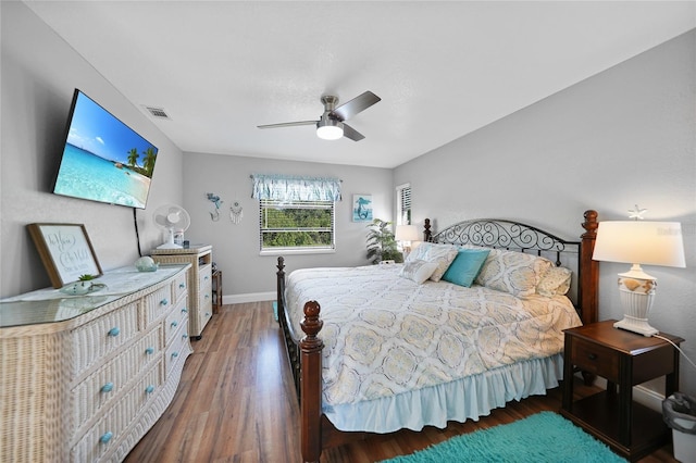 bedroom with hardwood / wood-style floors and ceiling fan